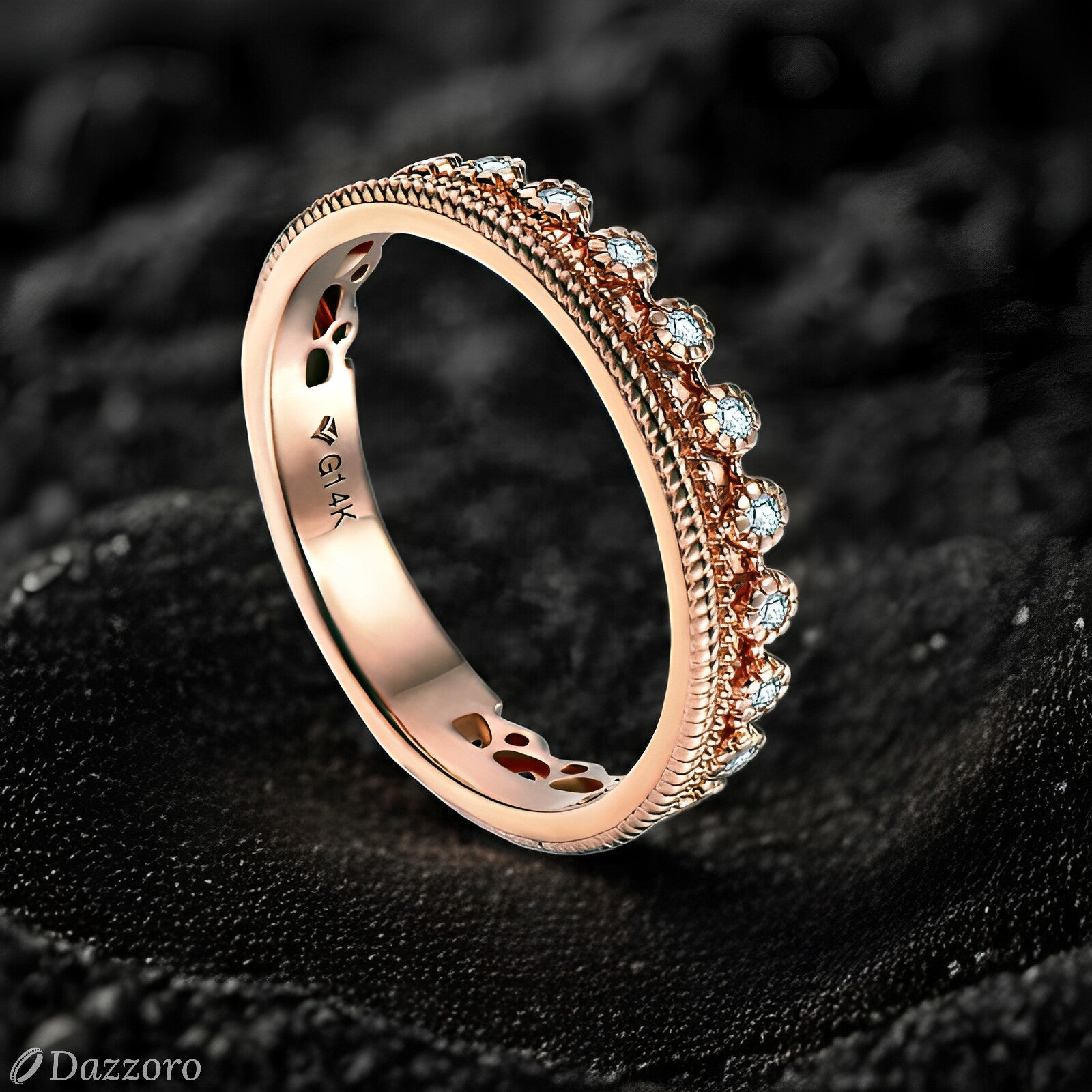 Rose gold ring with diamonds on a black textured background, featuring the brand 'Dazzzoro'.