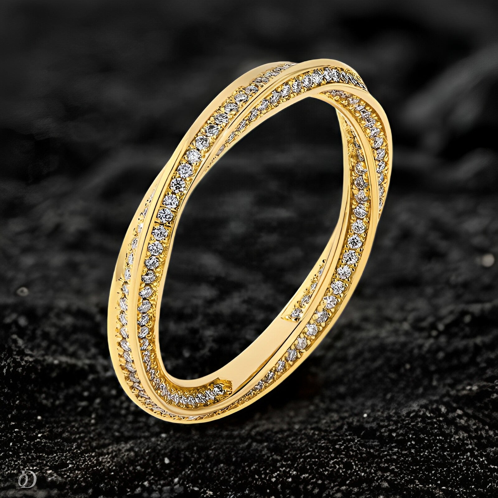 Gold ring with embedded diamonds on a dark textured background