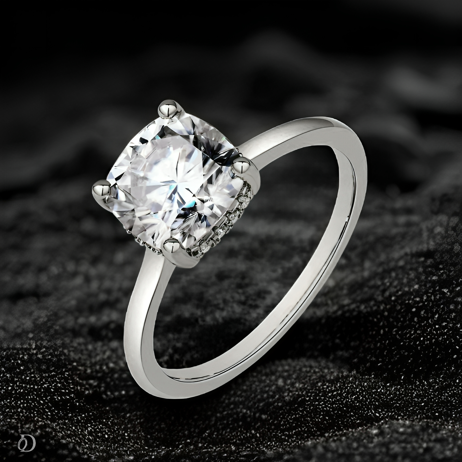 Silver ring with a large diamond on a black textured background