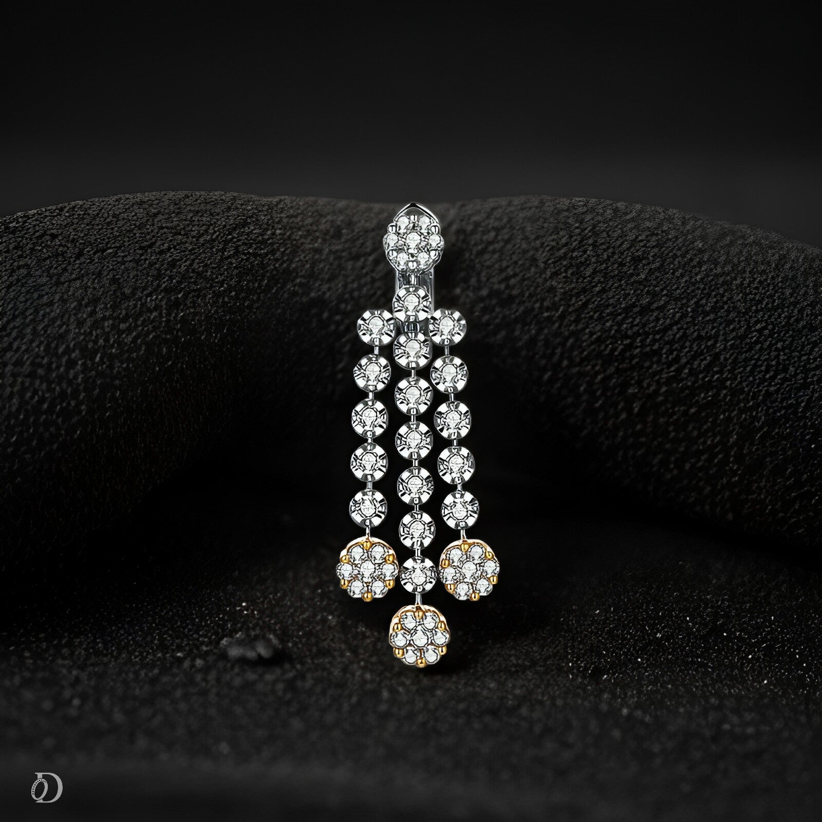 Elegant diamond earring on a black textured background