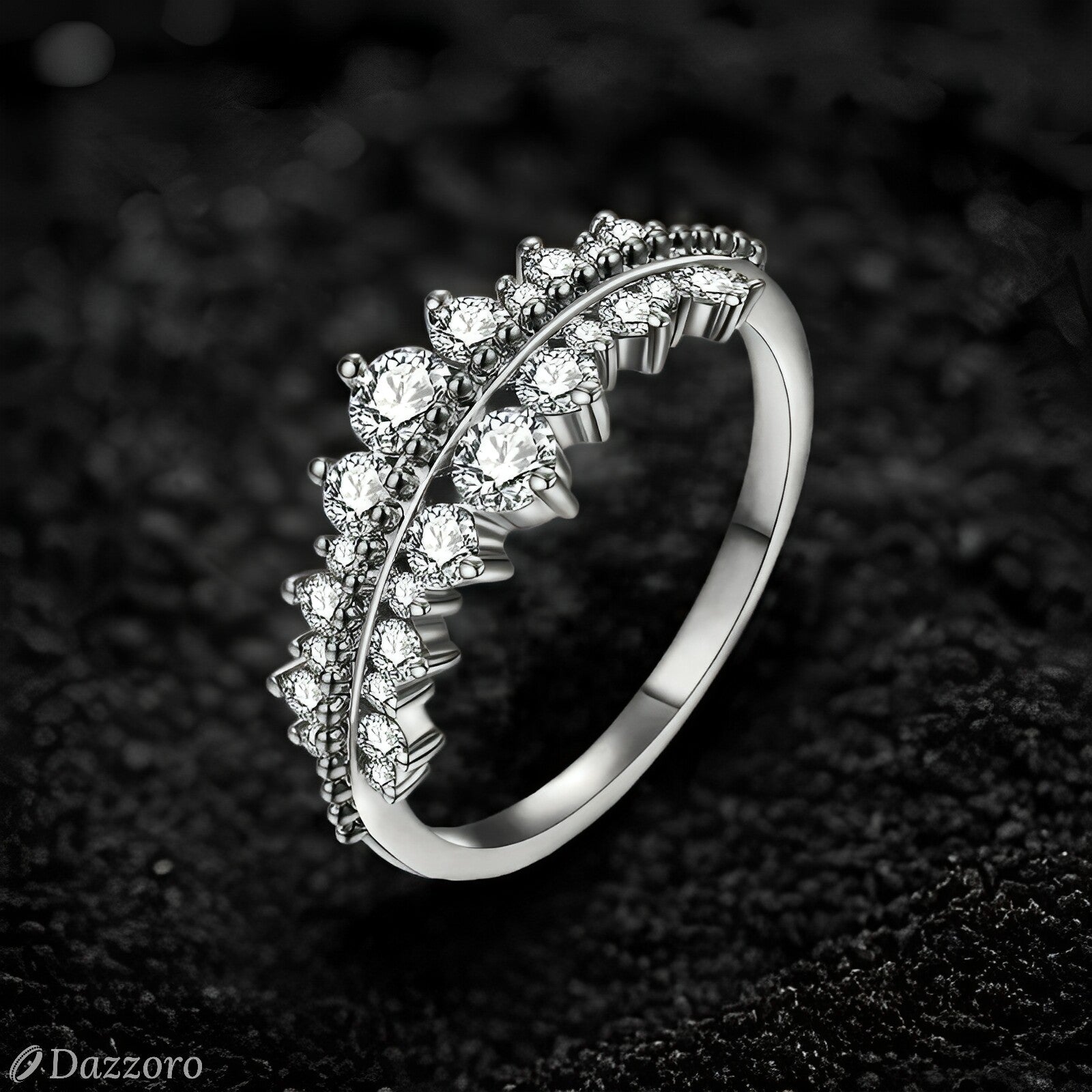 Silver ring with diamonds on a dark textured background, Dazzzoro brand visible