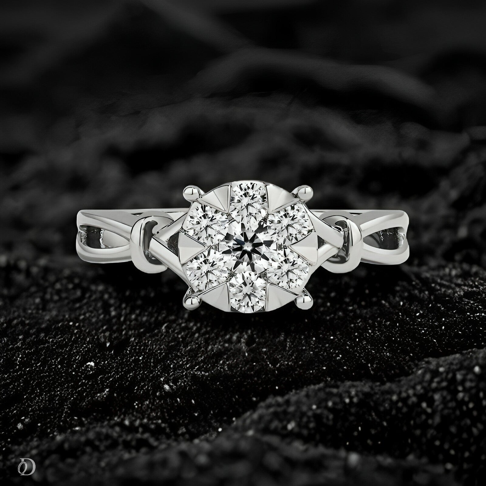 Diamond ring on a textured black surface